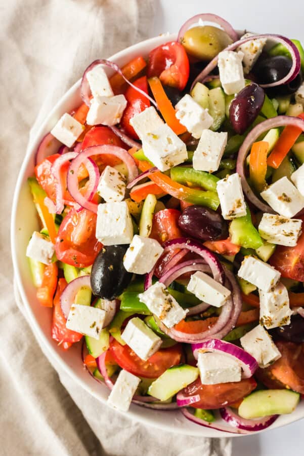 up close image of greek salad in bowl