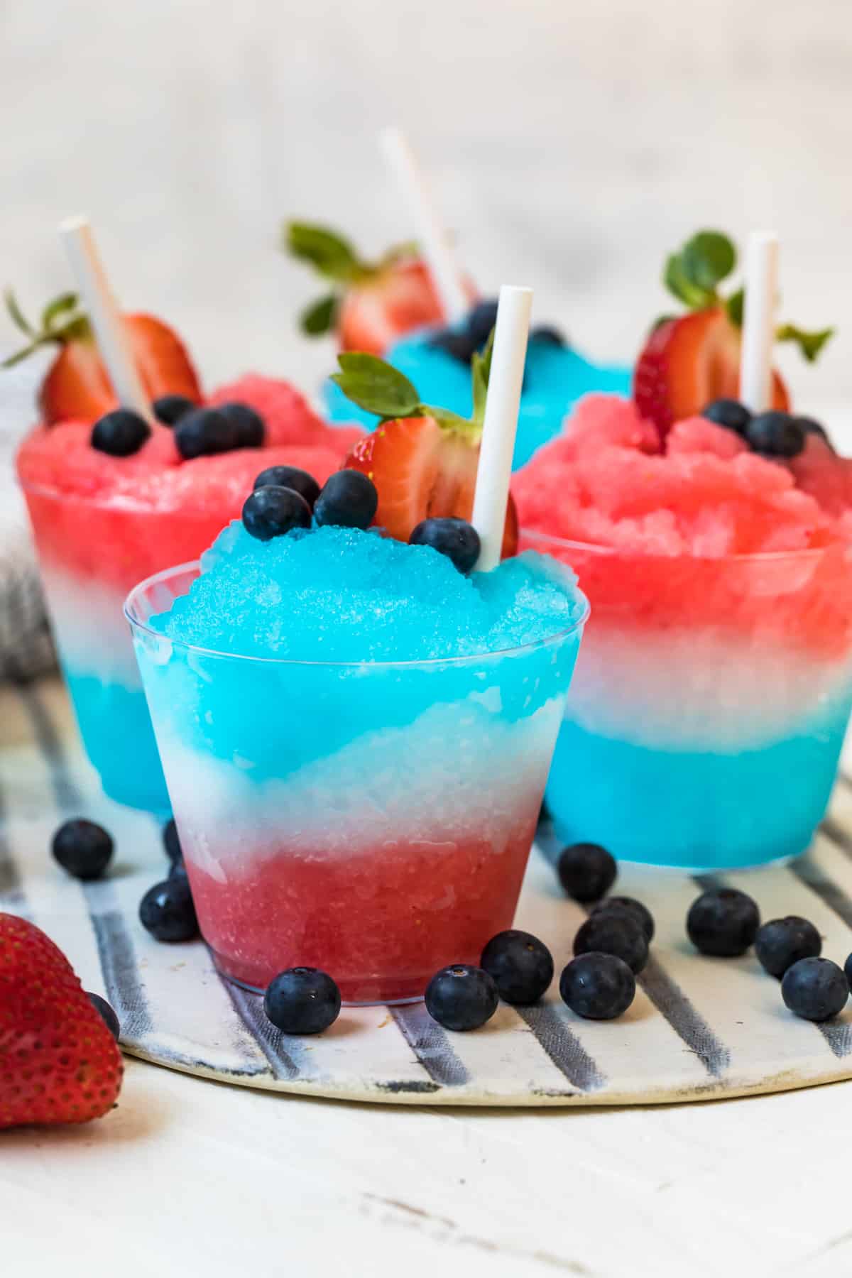 red white and blue margarita slushies on platter