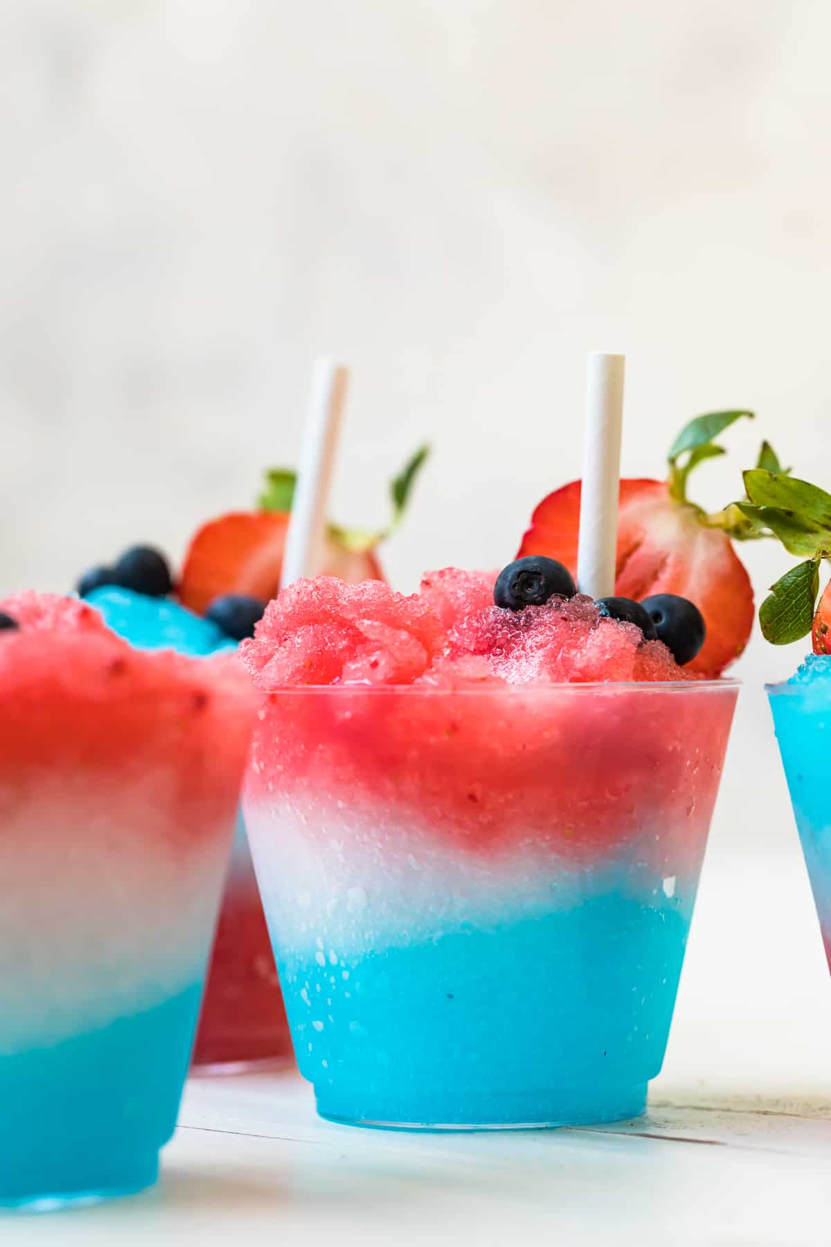 layered margarita slushie with s straw