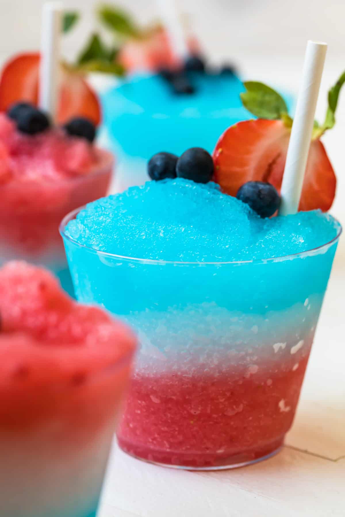 layered margarita slushie with s straw