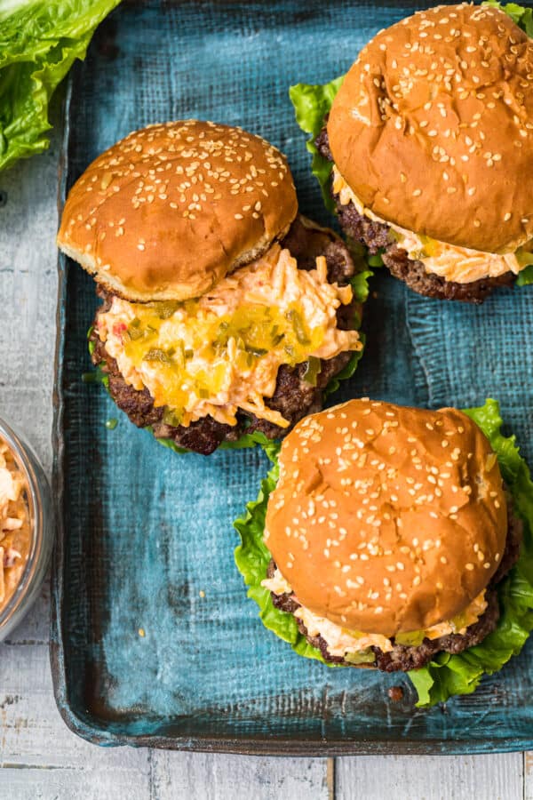 overhead image of cheeseburgers made with pimento cheese