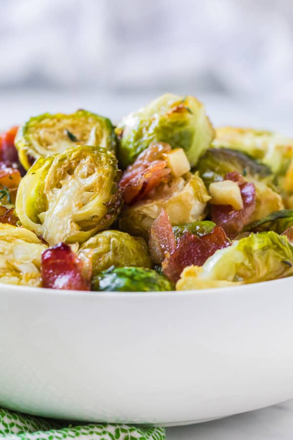 maple bacon brussels sprouts in white bowl