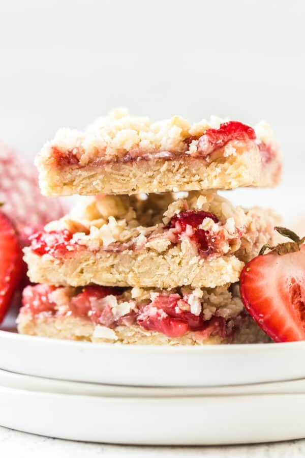 stacked strawberry bars on plate