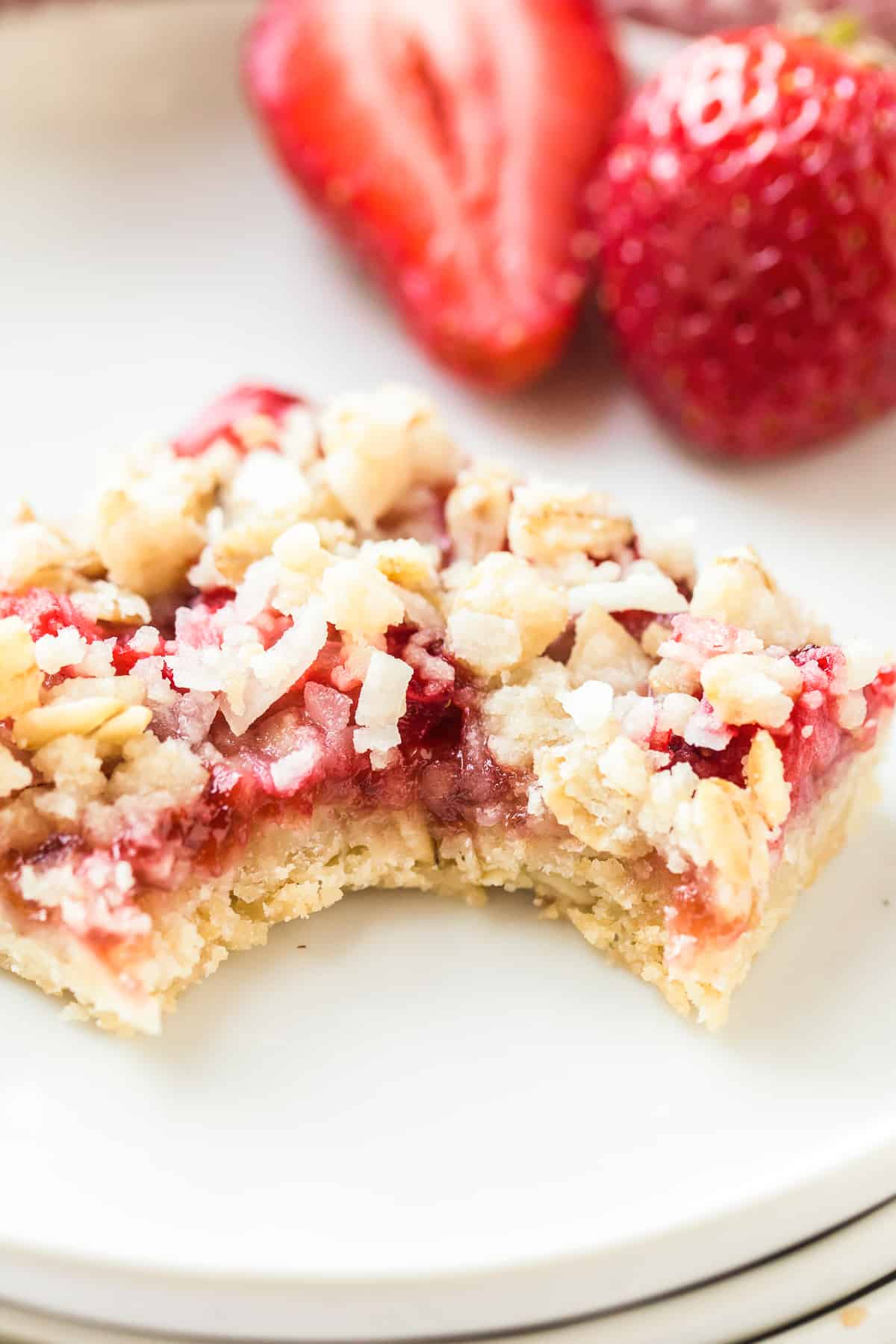 strawberry oatmeal bar with bite taken out
