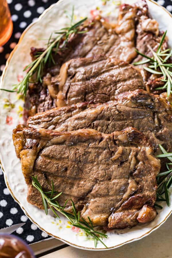 grilled ribeyes on platter