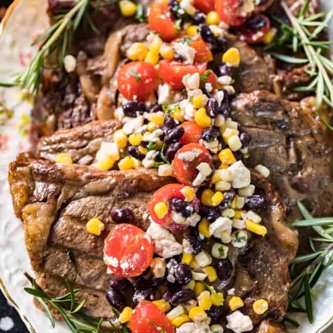 sweet tea marinated steaks topped with corn salad