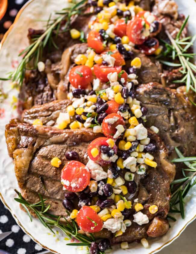 sweet tea marinated steaks topped with corn salad
