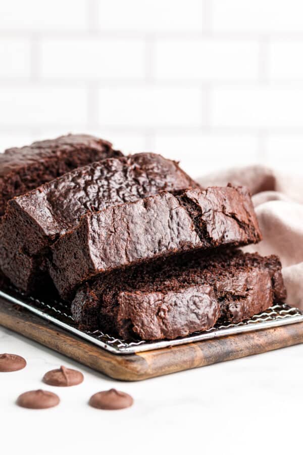 sliced double chocolate banana bread on cooling rack