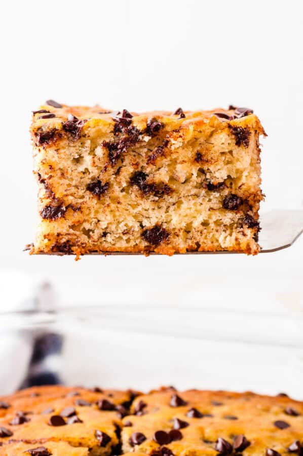 lifting up large chocolate chip banana bar
