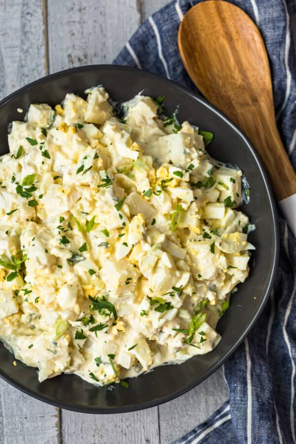 overhead image of potato salad with egg in bowl