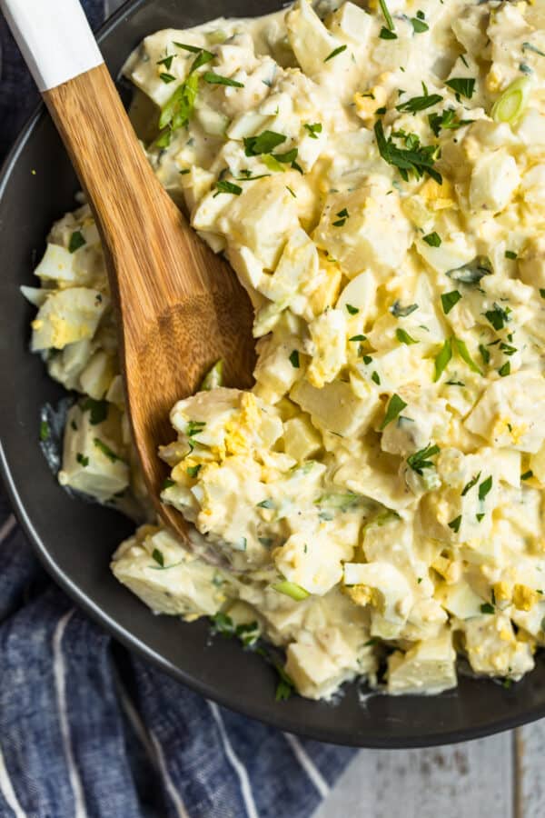 potato salad recipe with wooden spoon