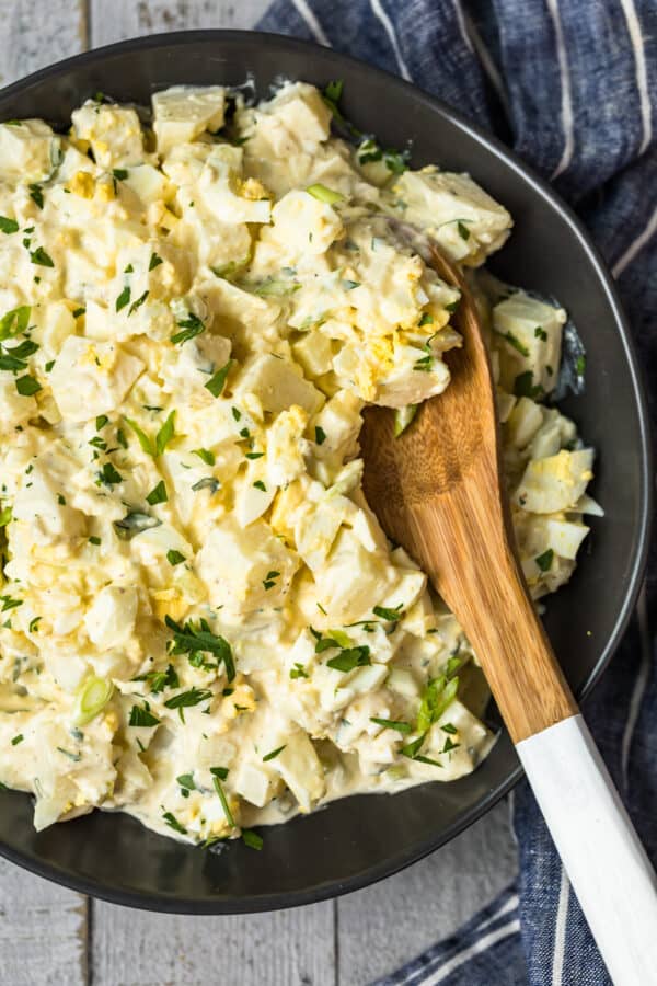 potato salad recipe with wooden spoon