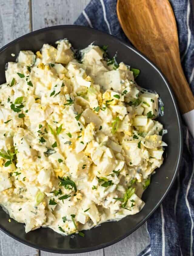 overhead image of potato salad with egg in bowl