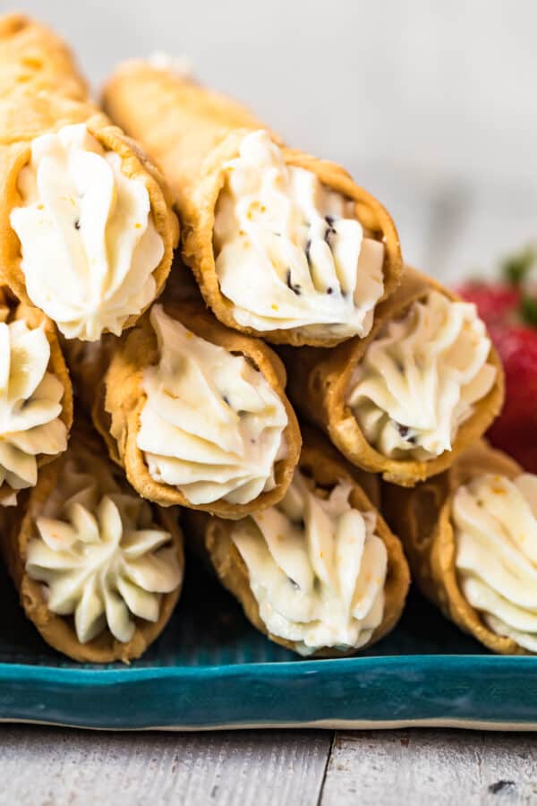 up close image of cannolis with cream