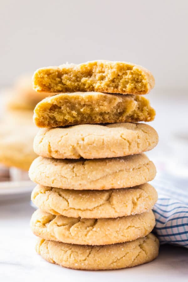 stacked sugar cookies on plate