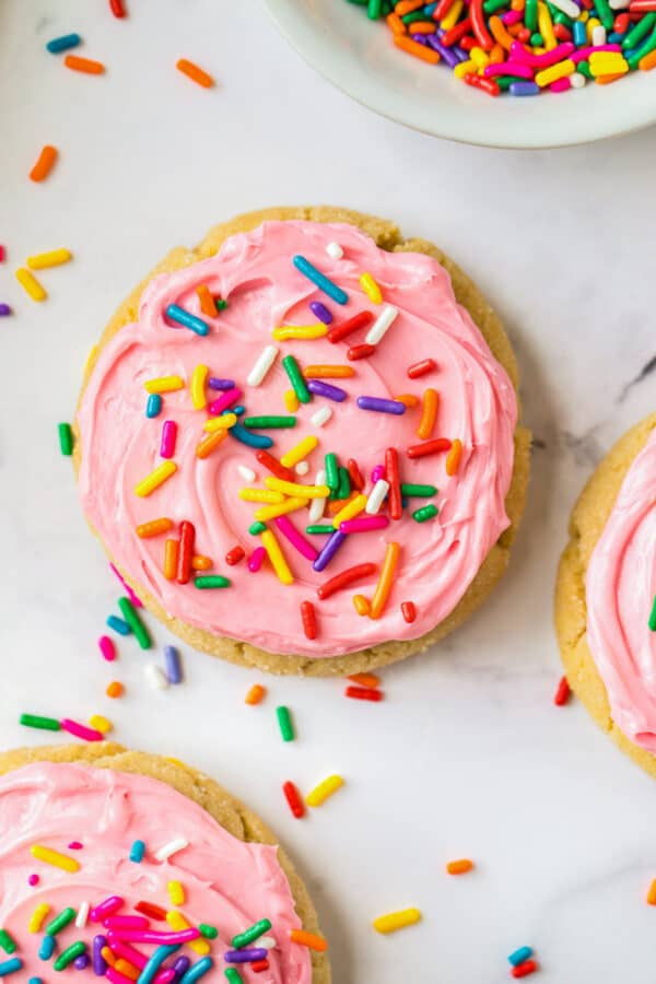 frosted sugar cookies with sprinkles