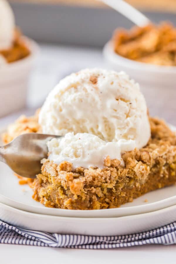 fork digging in to pumpkin crisp