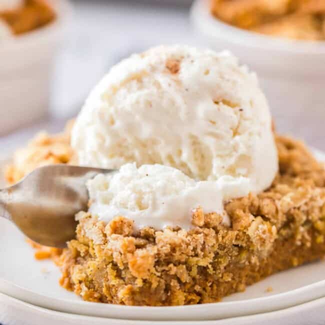 fork digging in to pumpkin crisp