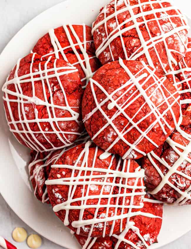 platter of stuffed red velvet cookies drizzled with white chocolate