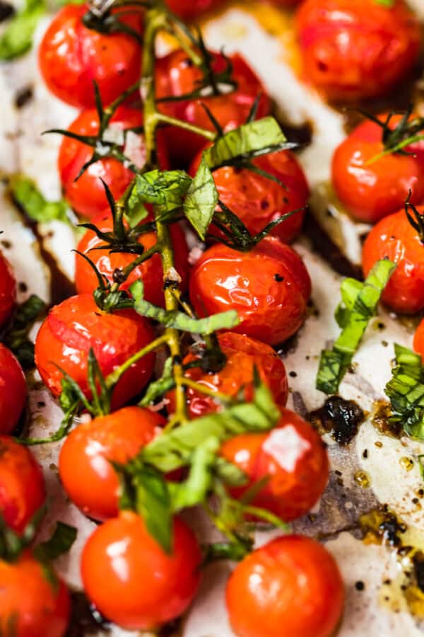 tomatoes with balsamic vinegar topped with basil