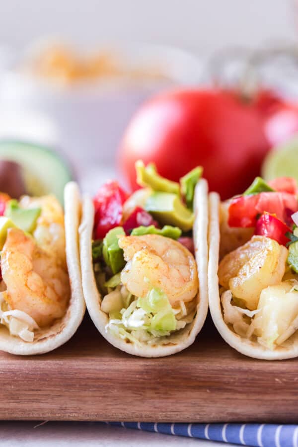 soft shrimp tacos on cutting board