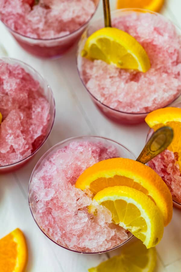 overhead image of pink summer wine slush in glasses