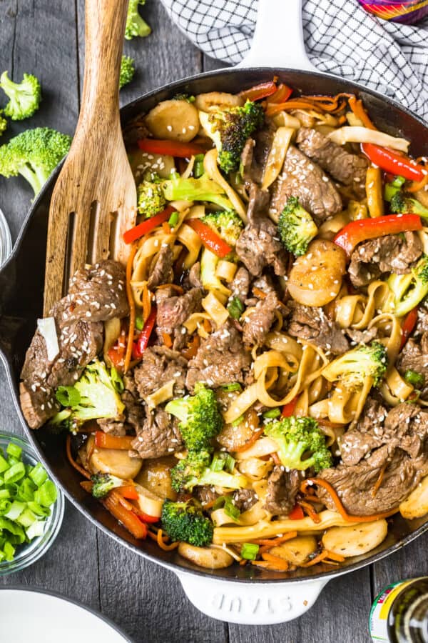 beef lo mein in white skillet