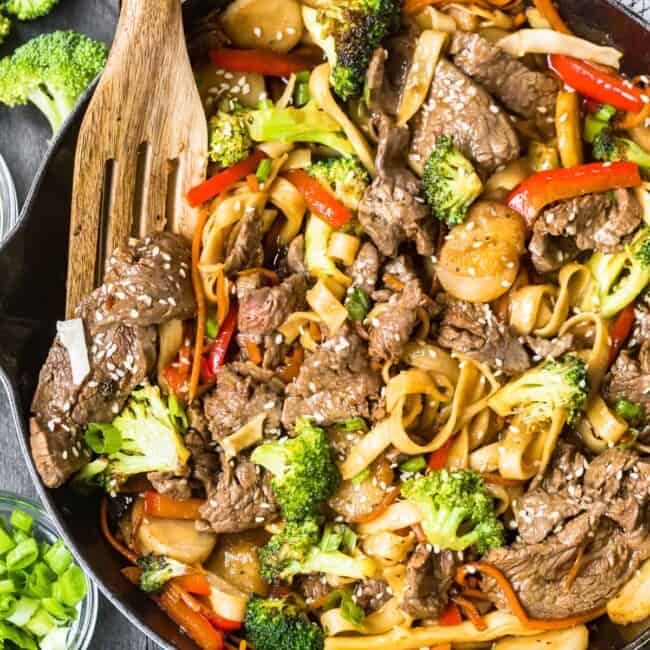 beef lo mein in white skillet