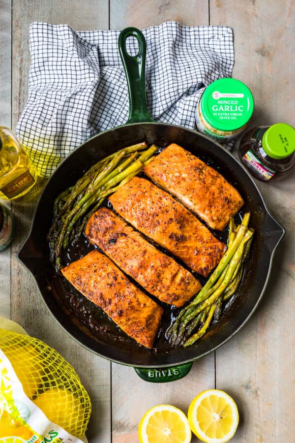 finished honey garlic salmon and asparagus in skillet