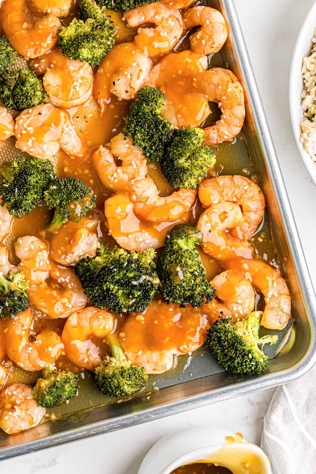 honey garlic shrimp and broccoli on sheet pan
