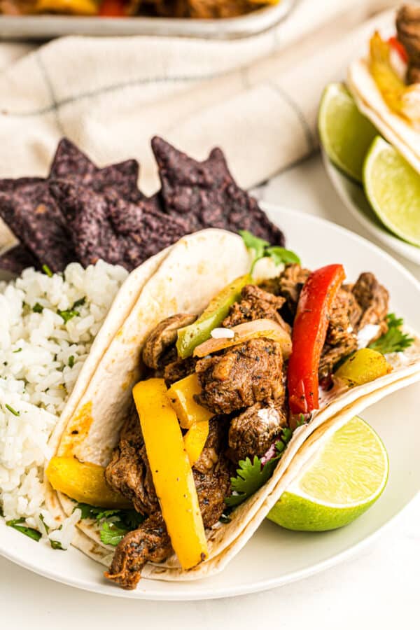 steak fajita on plate with rice