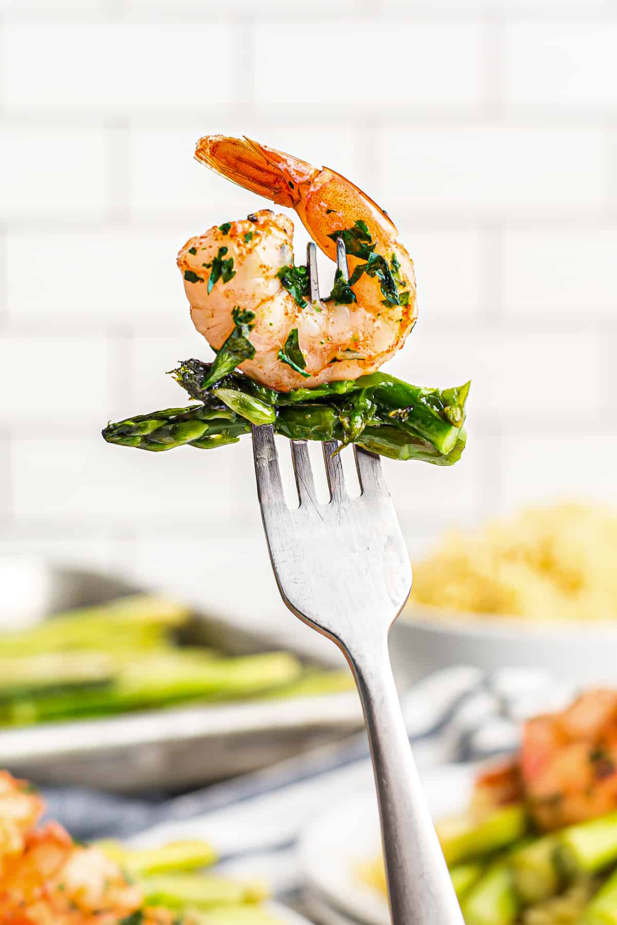 fork with shrimp and asparagus