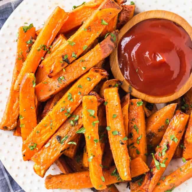 overhead image of sweet potato fries on plate with ketchup