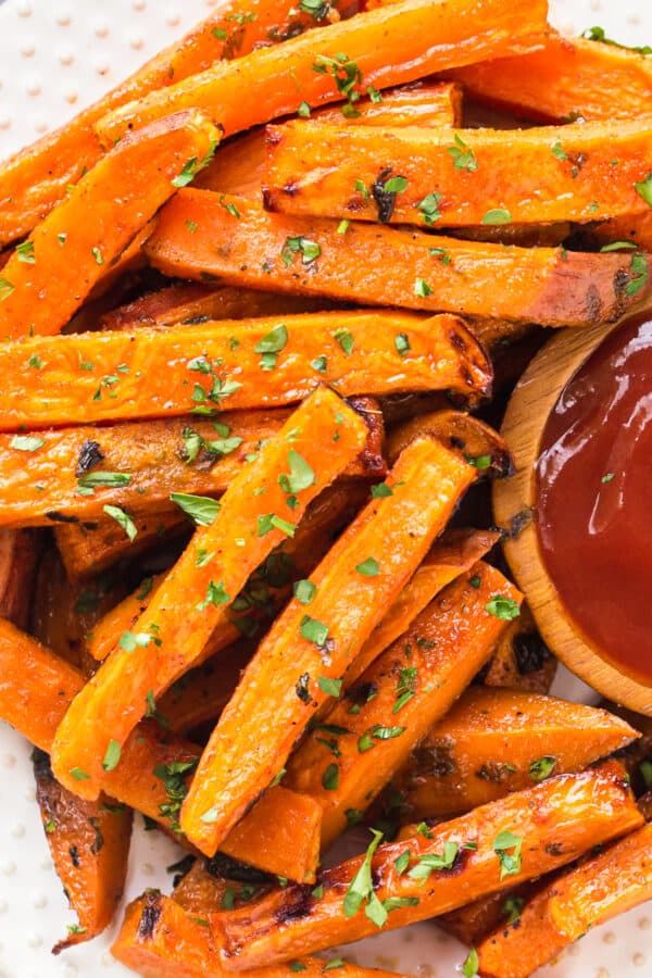 overhead image of sweet potato fries on plate with ketchup