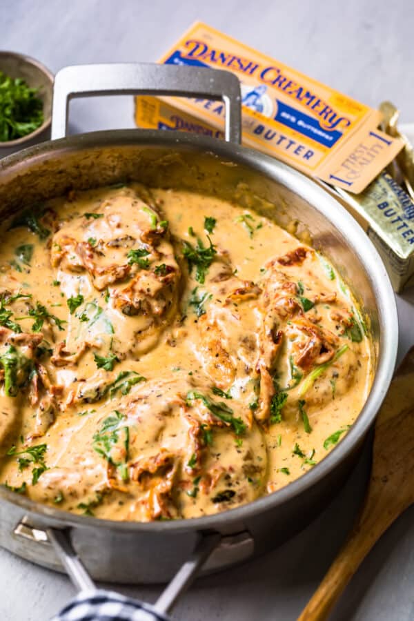 side shot of tuscan chicken in skillet