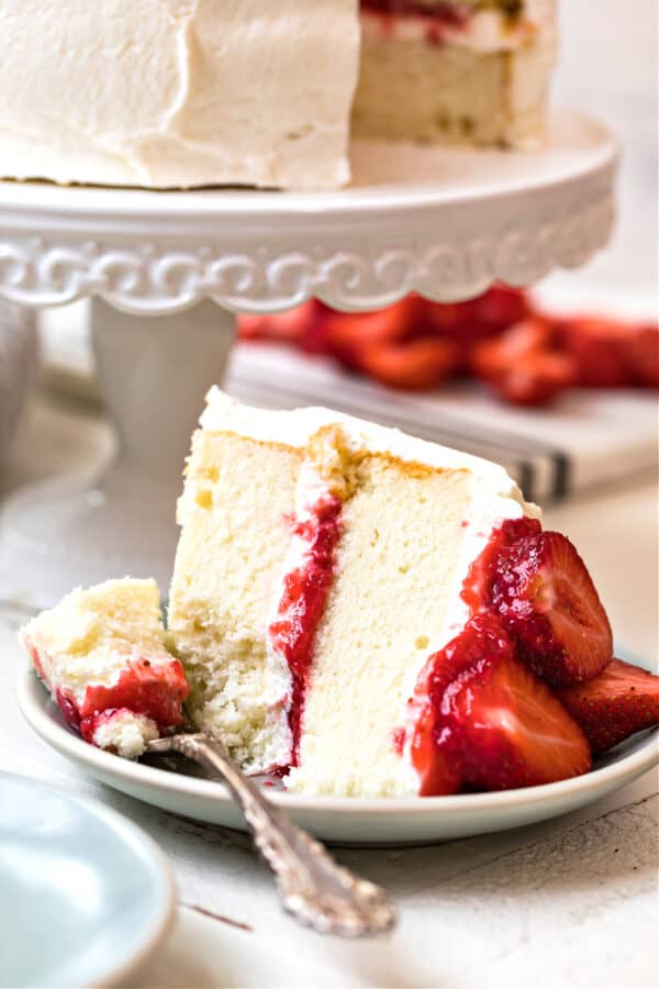 slice of white cake with strawberries