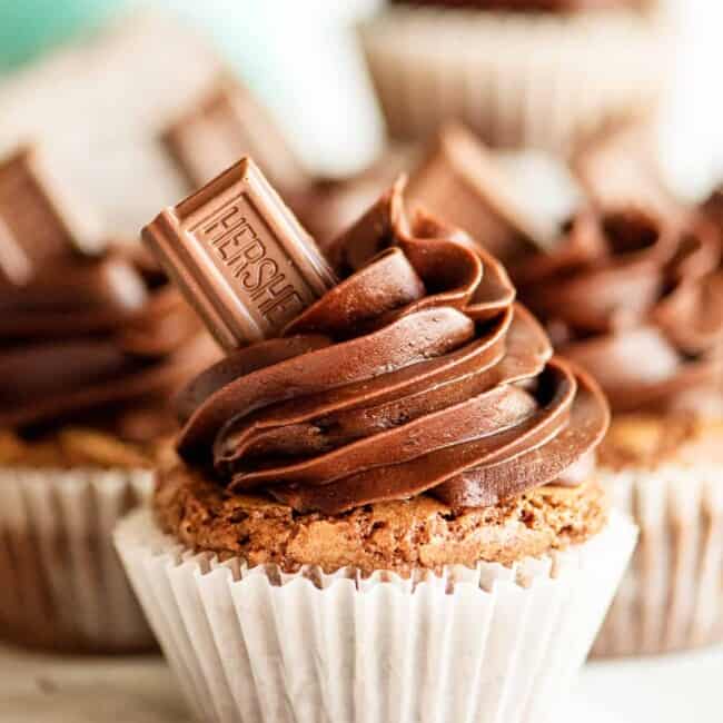 up close image of brownie cupcake with chocolate buttercream