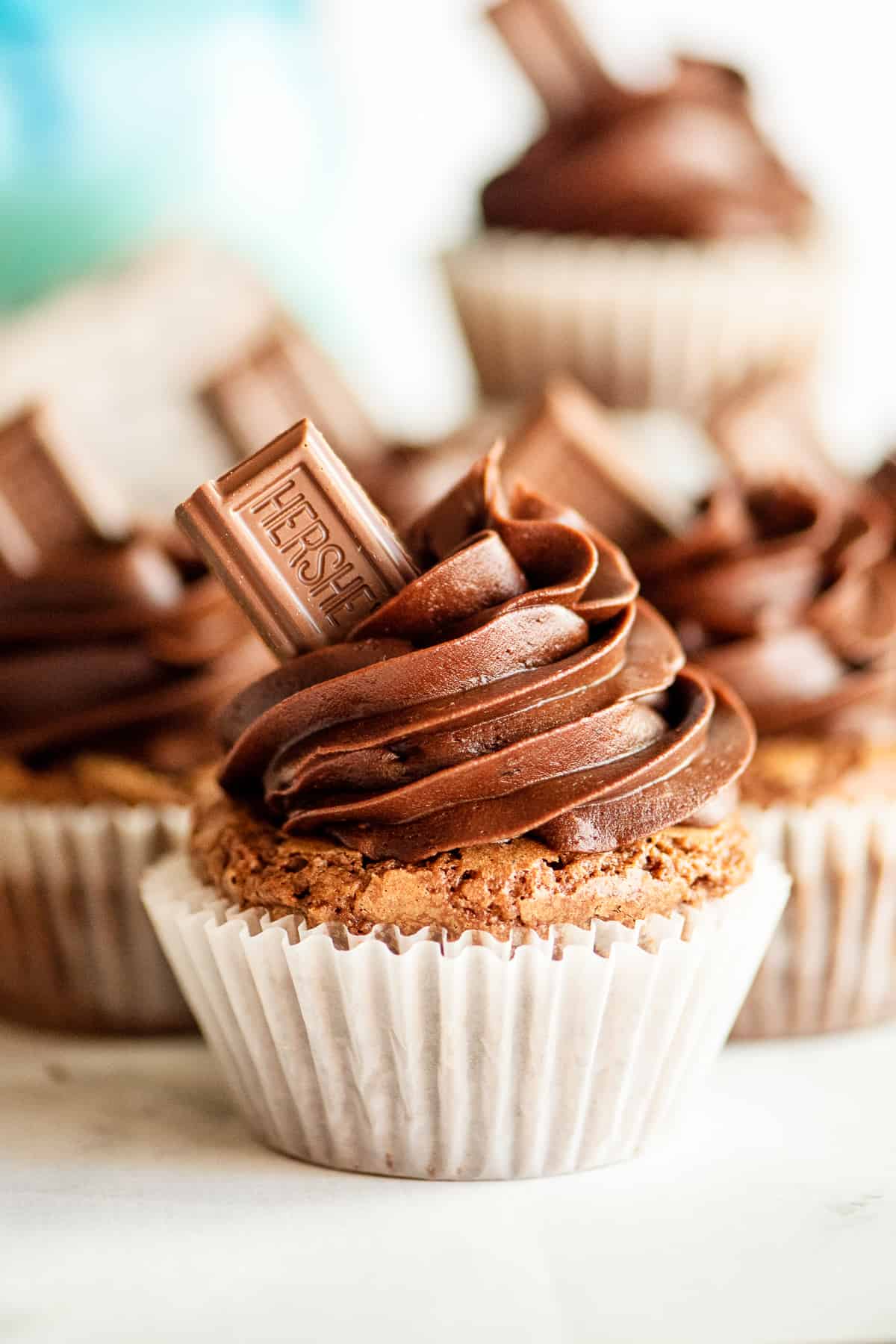 up close image of brownie cupcake with chocolate buttercream