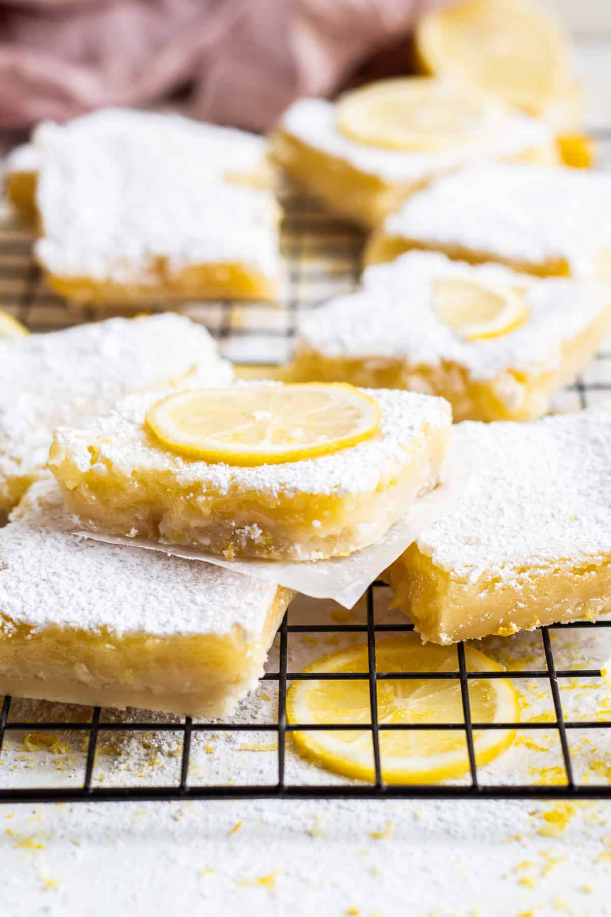 sliced lemon bars with powdered sugar