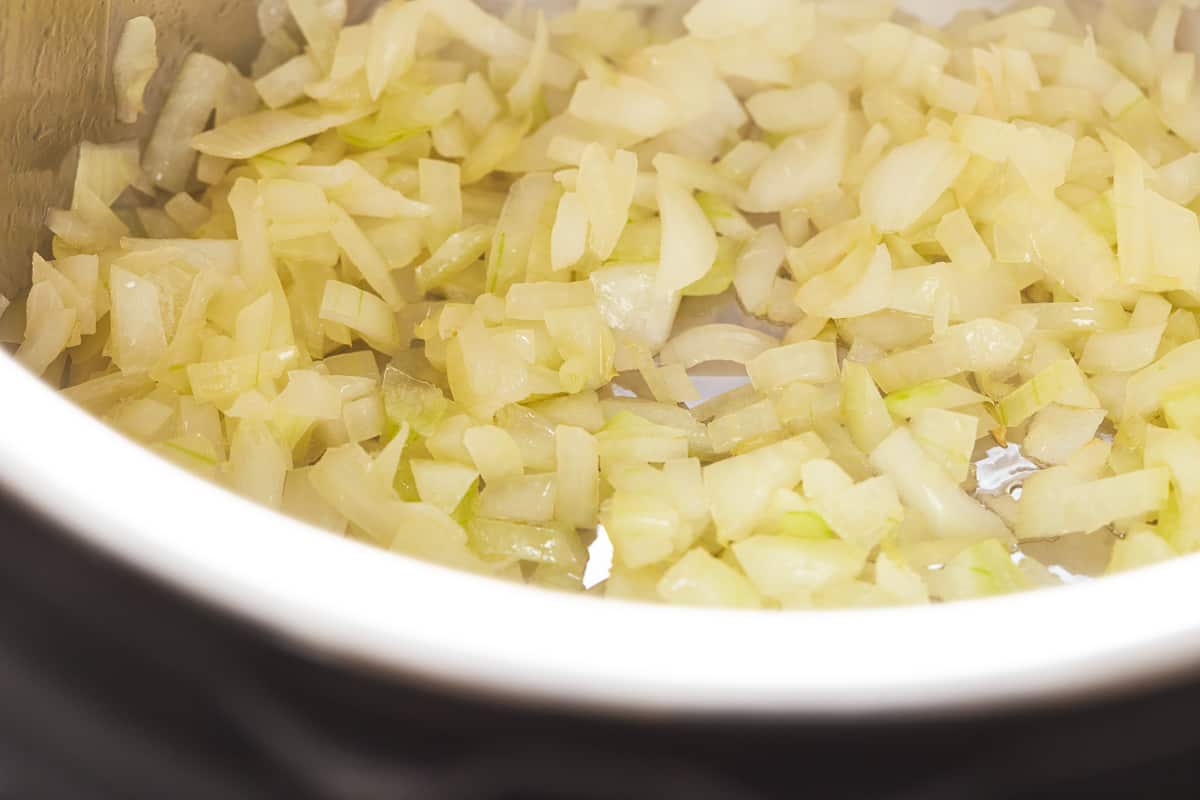 Onions cooking in an instant pot.