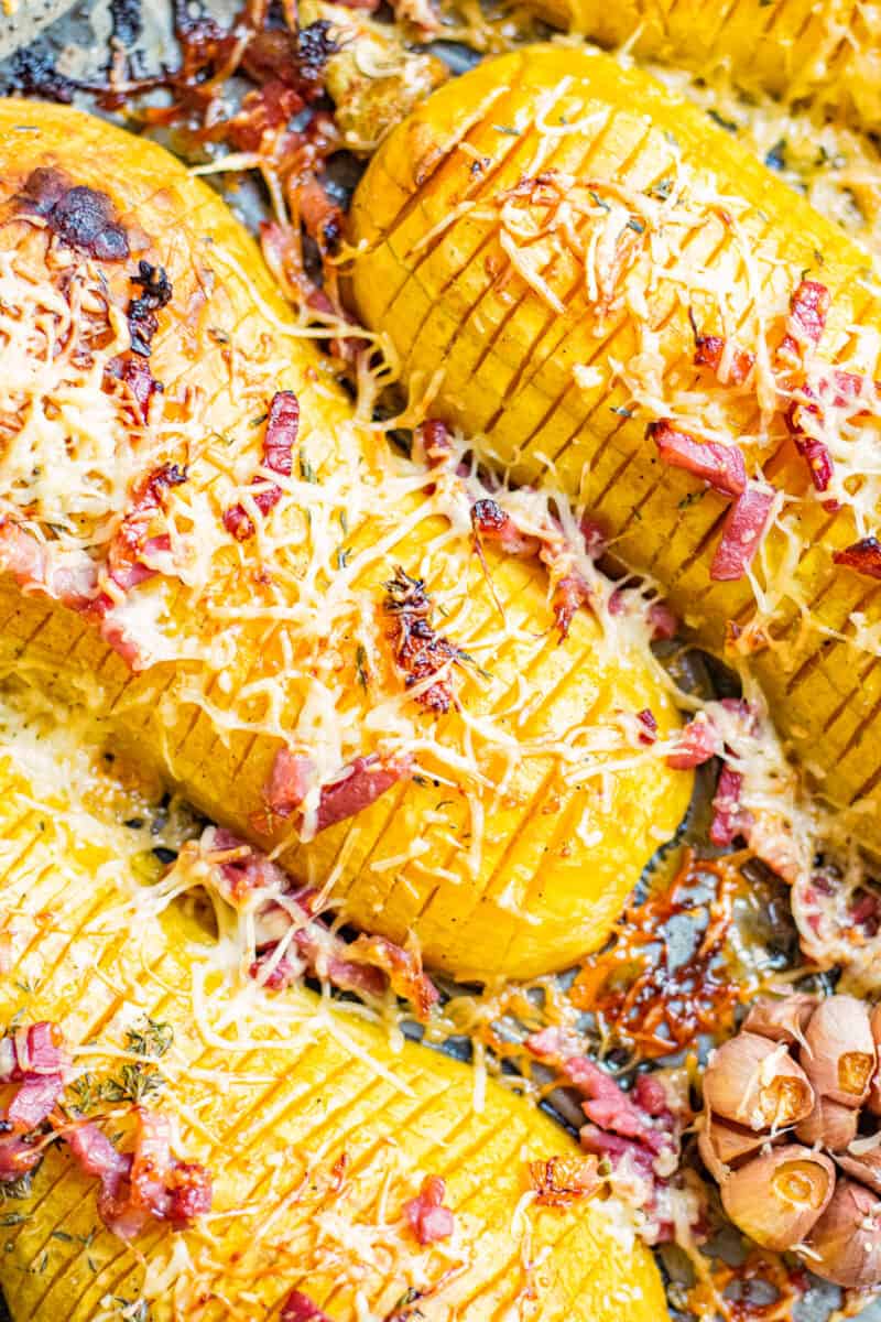 up close image of butternut squash with bacon and cheese