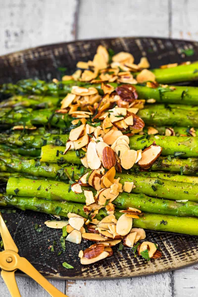 platter with asparagus topped with almonds