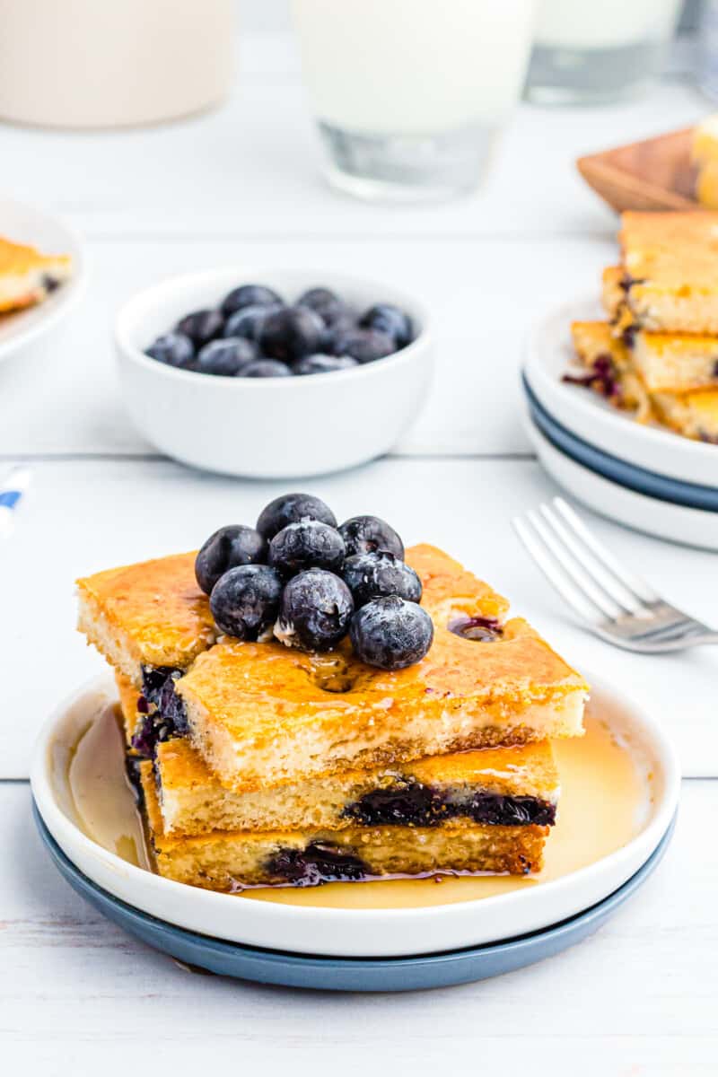 sheet pan blueberry pancakes topped with blueberries
