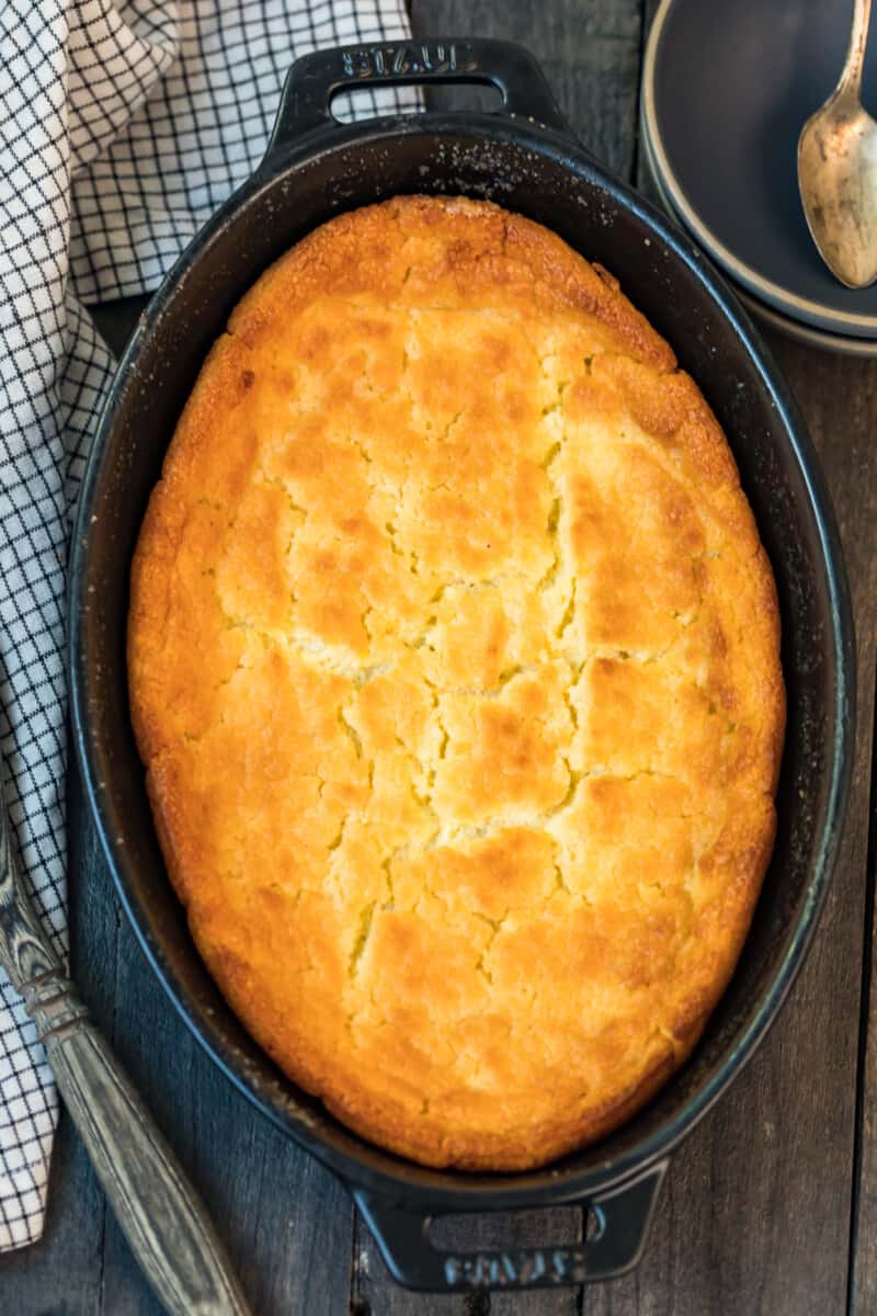 buttermilk spoon bread in black baking dish