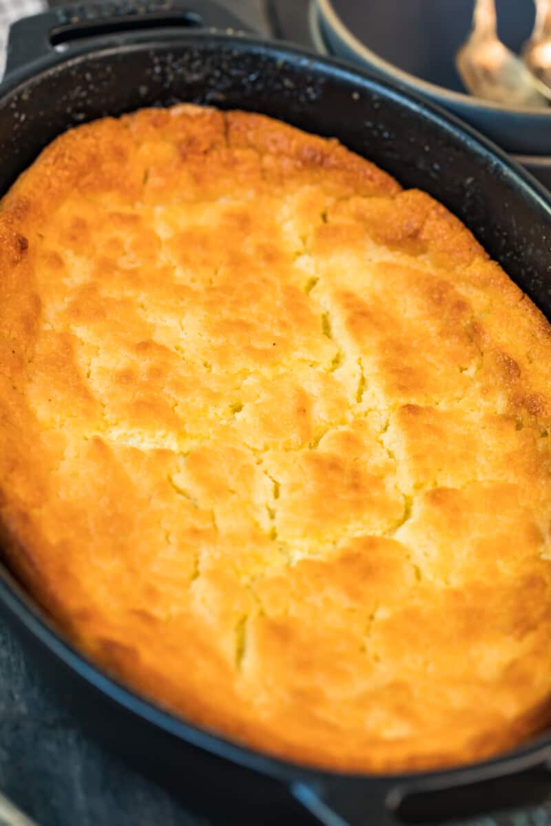 buttermilk spoon bread in black baking dish