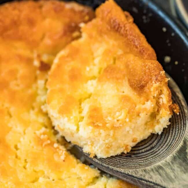lifting up spoonful of buttermilk spoon bread