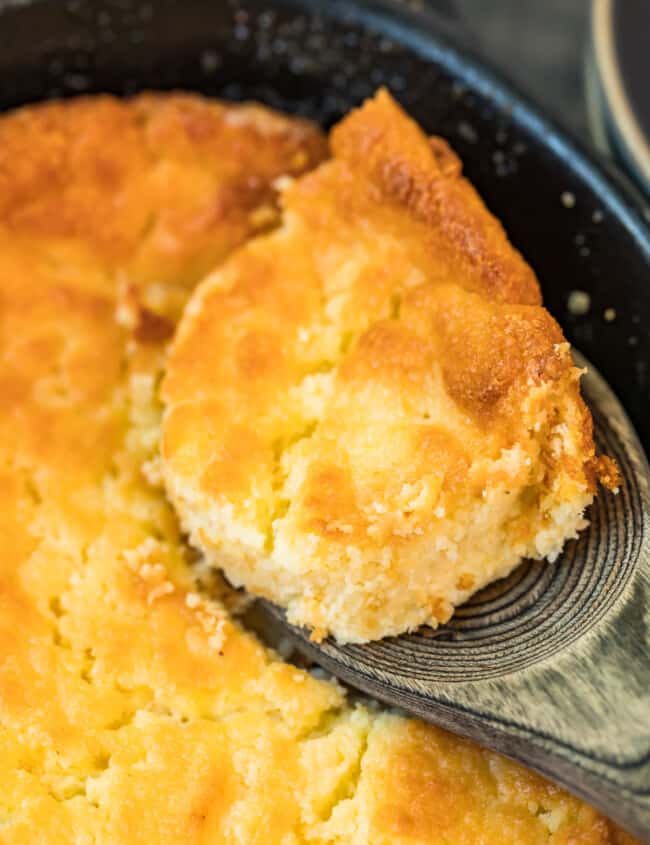 lifting up spoonful of buttermilk spoon bread