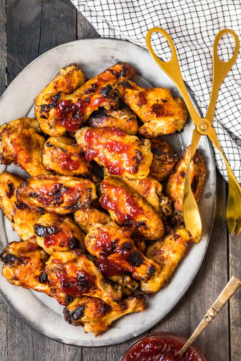 cranberry chicken wings on gray platter