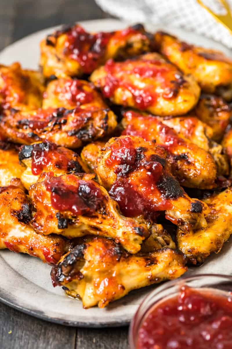 cranberry chicken wings on gray platter