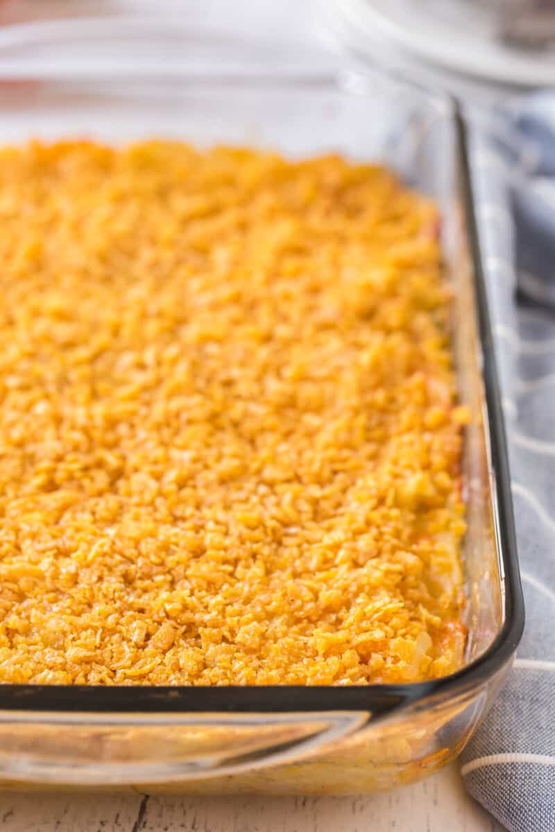 side image of funeral potato casserole in baking dish